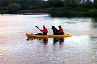 Photograph of a Newfoundland in a canoe